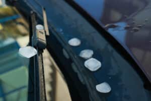 Hail damage to car